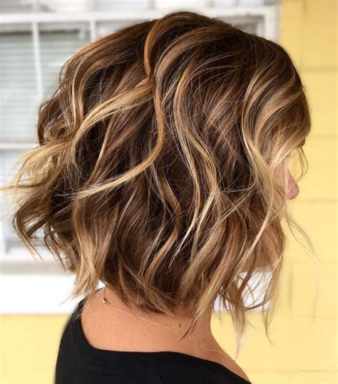 Whether you have short or lengthy locks, showcase those caramel vibes by wearing your hair organically tousled. . Light brown short hair with highlights